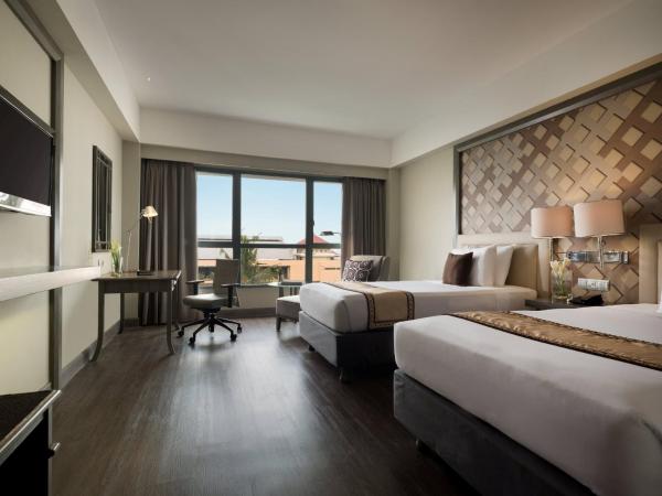 Melia Purosani Yogyakarta : photo 2 de la chambre chambre deluxe double ou lits jumeaux