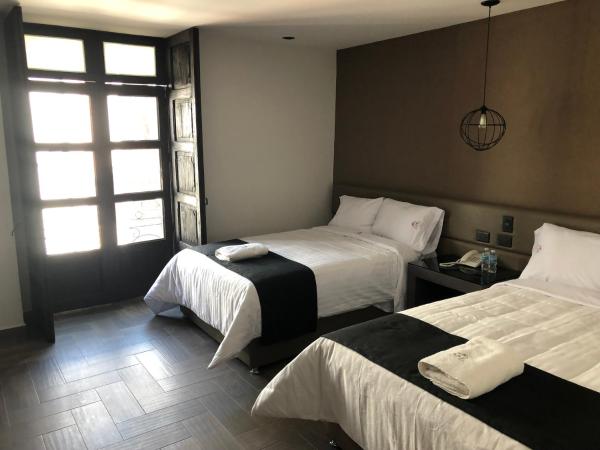 Hotel Isabel : photo 5 de la chambre chambre lits jumeaux