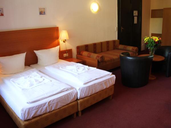 Hotel Aster an der Messe : photo 2 de la chambre chambre triple