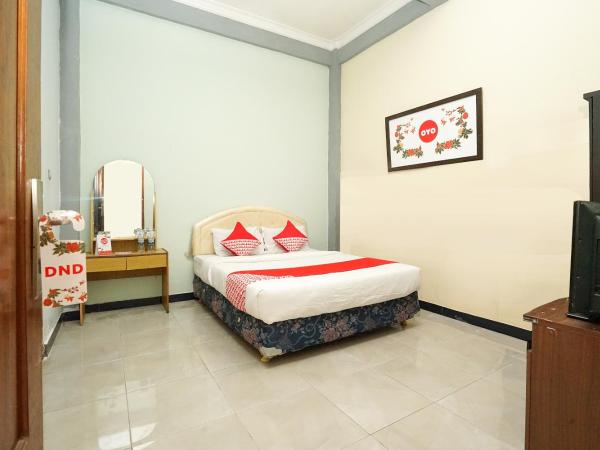 Kartika Syariah Homestay by Stayku : photo 6 de la chambre chambre double standard