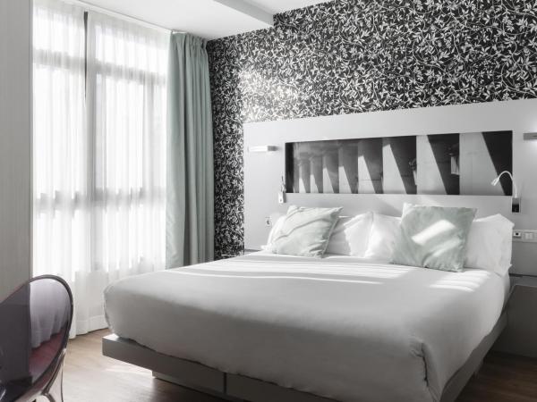 Petit Palace Plaza Mayor : photo 5 de la chambre chambre quadruple (4 adultes)