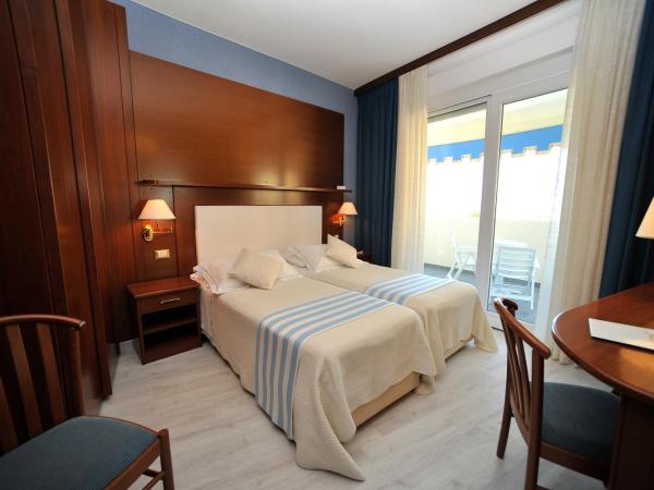 Hotel Corallo : photo 1 de la chambre chambre triple confort