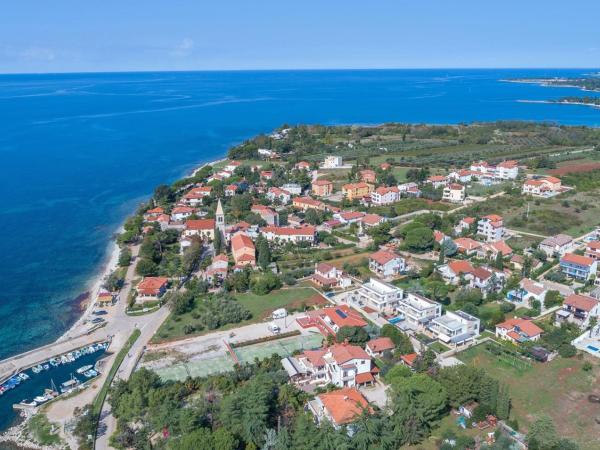 Apartment Complex Orzan Lovrecica : photo 2 de la chambre appartement - vue sur jardin