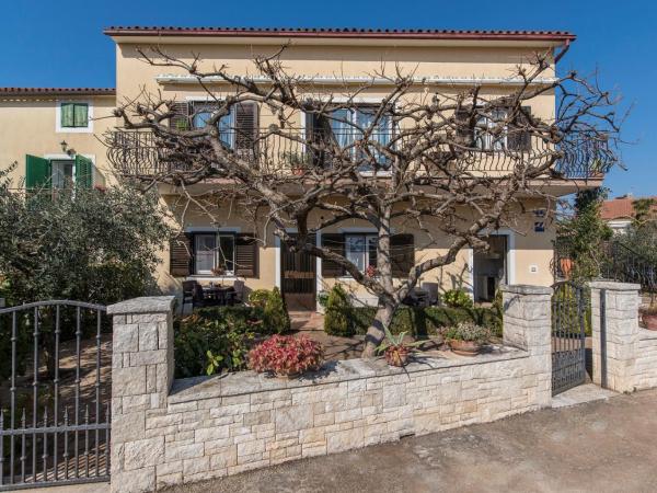 Apartment Complex Orzan Lovrecica : photo 7 de la chambre appartement - vue sur jardin