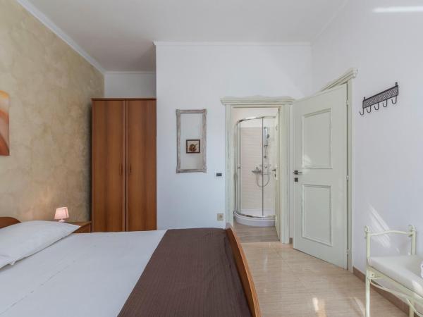 Apartment Complex Orzan Lovrecica : photo 8 de la chambre appartement - vue sur jardin