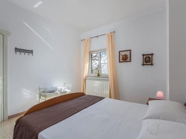 Apartment Complex Orzan Lovrecica : photo 10 de la chambre appartement - vue sur jardin