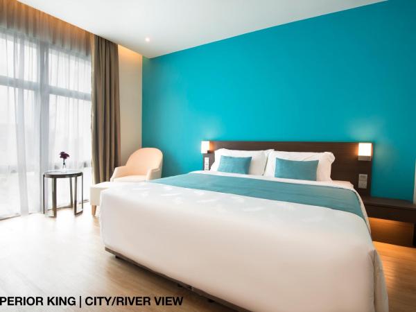 Astana Wing - Riverside Majestic Hotel : photo 2 de la chambre chambre lits jumeaux supérieure - vue sur ville