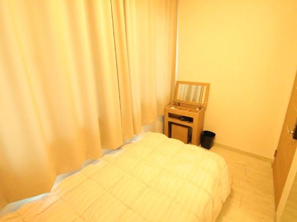 Stitches House : photo 4 de la chambre chambre simple avec salle de bains commune