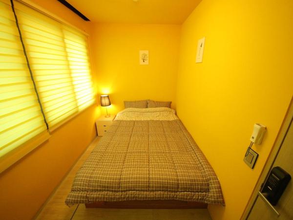 Stitches House : photo 4 de la chambre chambre double standard avec salle de bains commune