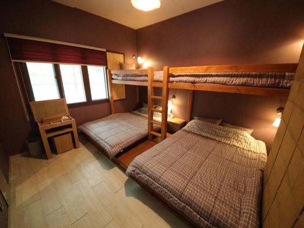 Stitches House : photo 4 de la chambre chambre familiale avec salle de bains privative