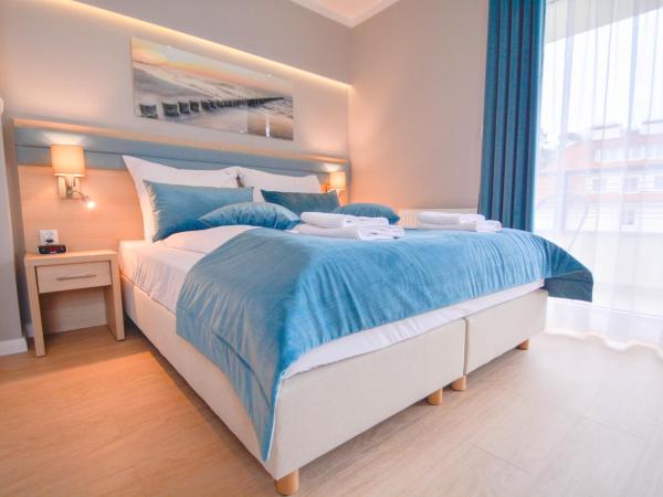 Apartamenty Cesarskie - Apartamenty Bryza - Parking : photo 9 de la chambre one-bedroom apartment with garage