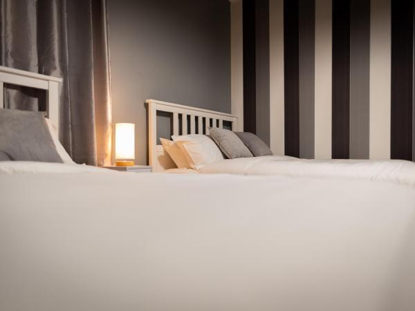 REM Hotel : photo 3 de la chambre chambre quadruple