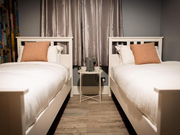 REM Hotel : photo 4 de la chambre chambre lits jumeaux