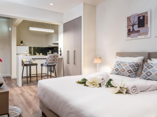 Urban Nest - Suites & Apartments : photo 1 de la chambre chambre double supérieure