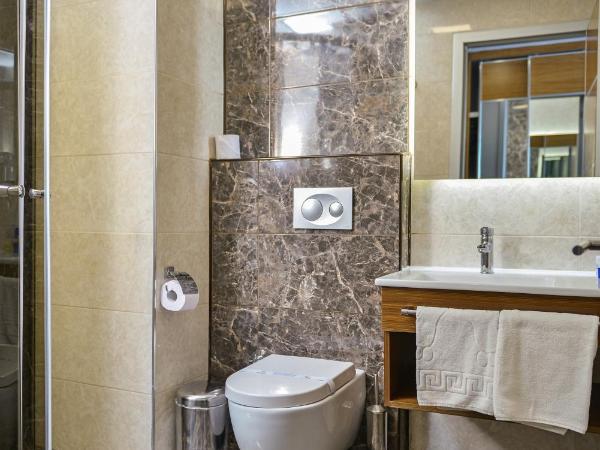 Hakcan Hotel : photo 7 de la chambre chambre triple