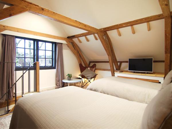 Authentic Farmhouse - De Vergulden Eenhoorn : photo 2 de la chambre suite avec baignoire