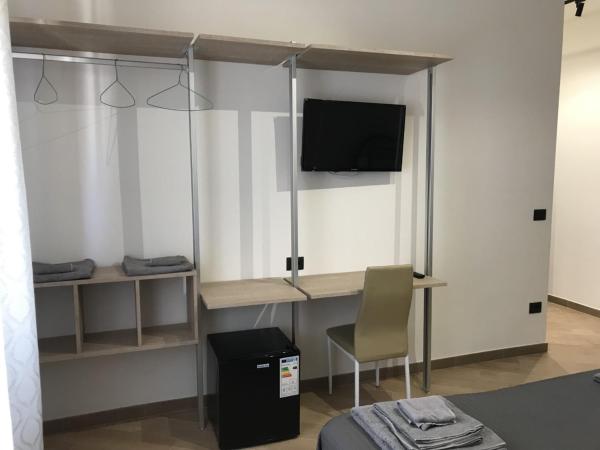 Riva Reno 4 Rooms : photo 3 de la chambre chambre quadruple