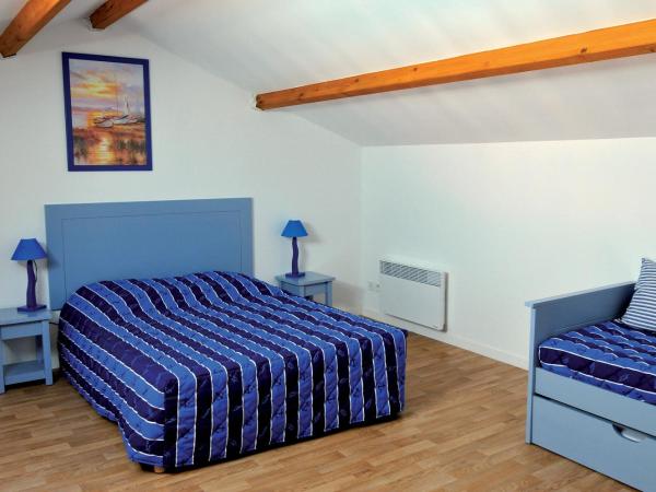 Vacancéole - Les Jardins de l'Amirauté : photo 4 de la chambre appartement en duplex