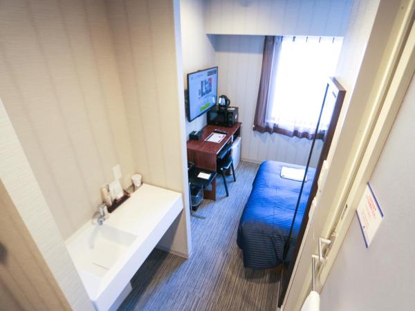 HOTEL LiVEMAX Sapporo Susukino : photo 6 de la chambre chambre double standard avec petit lit double - fumeurs