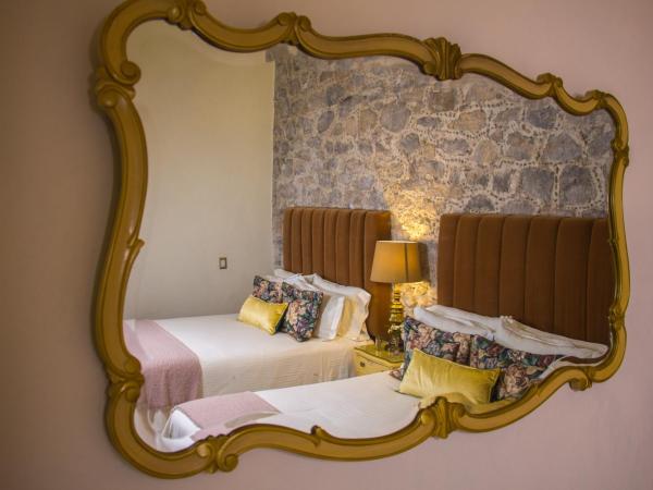 Luma B&B Boutique : photo 9 de la chambre chambre quadruple avec salle de bains