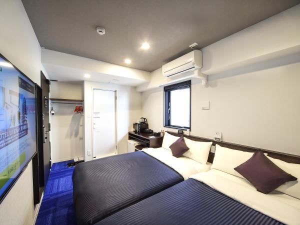 HOTEL LiVEMAX Hakataeki Minami : photo 2 de la chambre chambre lits jumeaux - fumeurs