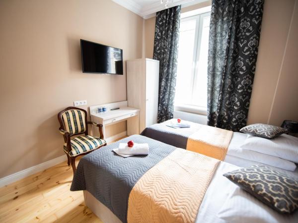 Old Town Boutique Rooms : photo 2 de la chambre chambre double ou lits jumeaux