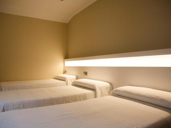 Casa Canosa : photo 4 de la chambre chambre triple avec salle de bains