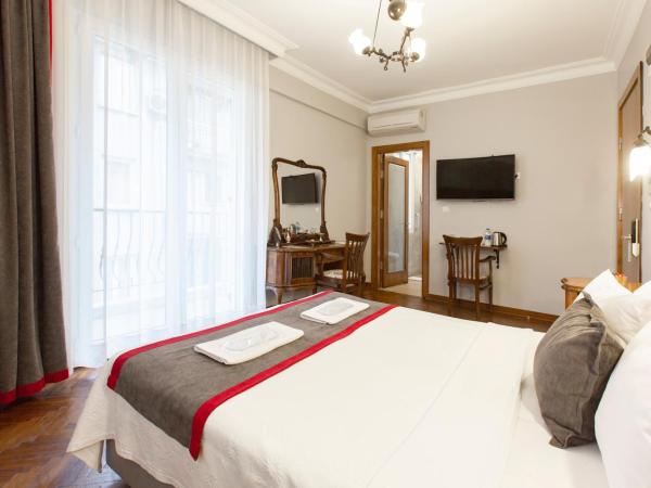 Queen Seagull Boutique Hotel : photo 4 de la chambre chambre lit king-size avec balcon