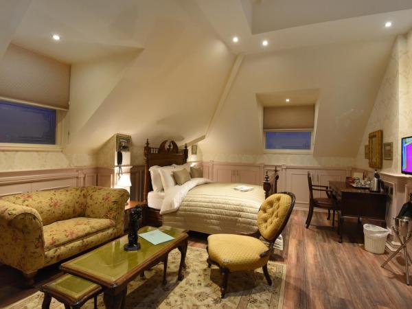 The Aston Tavern : photo 6 de la chambre suite deluxe avec lit king-size