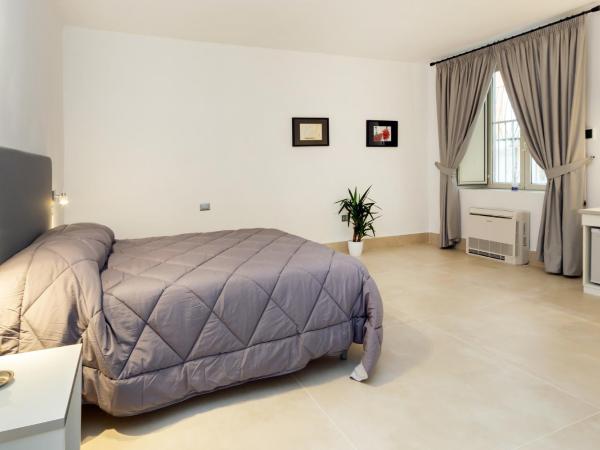 Il Tesoro Smart Suite & SPA : photo 1 de la chambre chambre double avec salle de bains privative