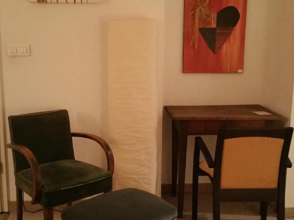 Chambres touristiques La Cour Des Hôtes : photo 5 de la chambre chambre quadruple classique