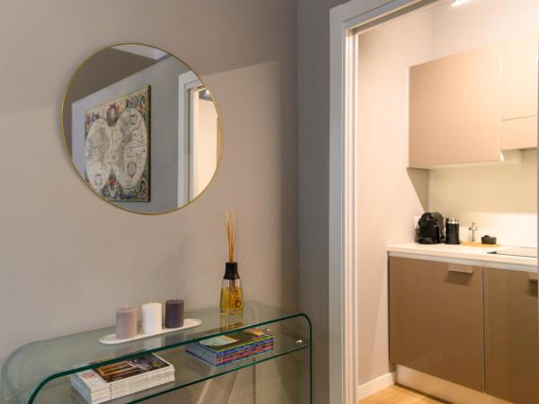 Savoia Suites Torino : photo 4 de la chambre chambre quadruple - vue sur jardin