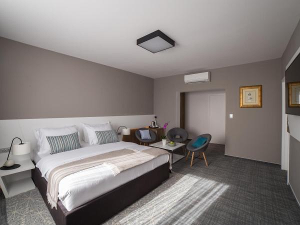 Residence Vaal : photo 1 de la chambre suite lit king-size - vue sur mer