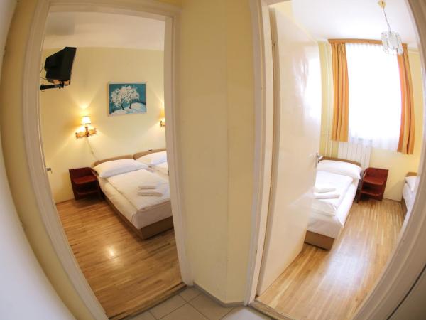 Hotel Bara Junior : photo 2 de la chambre chambre quadruple