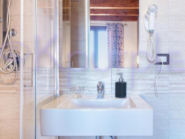 LE API : photo 1 de la chambre chambre double ou lits jumeaux standard avec balcon