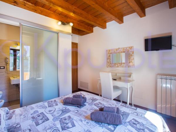 LE API : photo 5 de la chambre chambre double ou lits jumeaux standard avec balcon