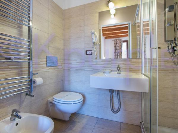 LE API : photo 6 de la chambre chambre double ou lits jumeaux standard avec balcon