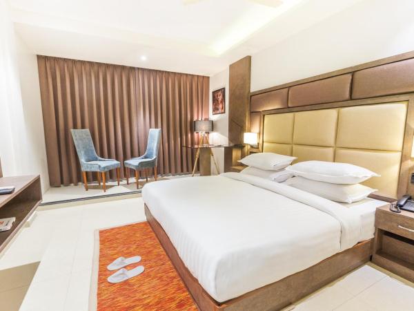 Aura One Hotel : photo 4 de la chambre chambre lit king-size deluxe