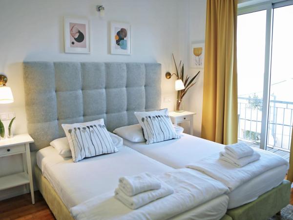 Hotel Delfin : photo 3 de la chambre chambre familiale (2 adultes et 2 enfants)