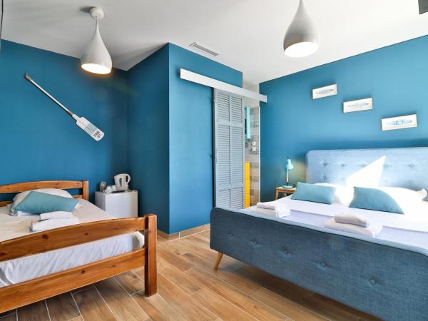 Hôtel La Bastide : photo 2 de la chambre chambre triple