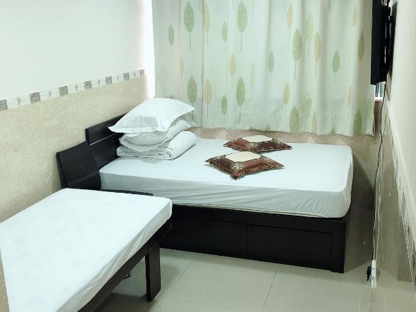 Hung Fai Guest House : photo 6 de la chambre chambre triple