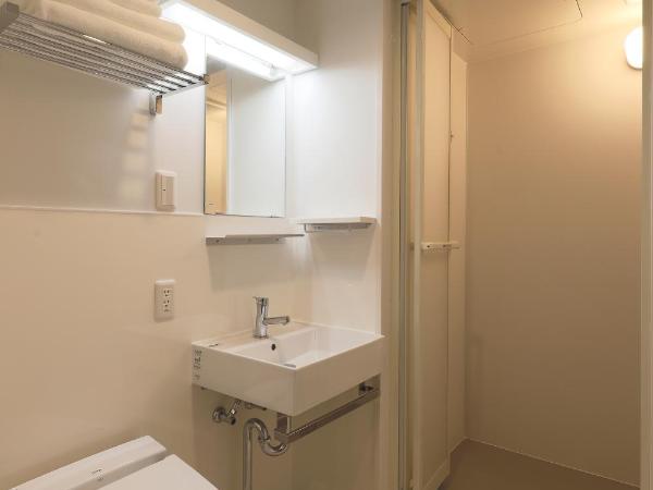 Kyomachiya Ryokan Sakura Urushitei : photo 6 de la chambre chambre lits jumeaux de style japonais - vue sur loft et jardin