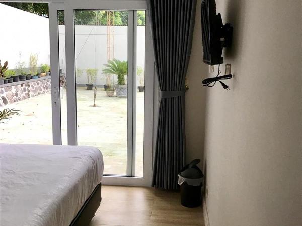 Omah SunFlower : photo 9 de la chambre chambre lit queen-size avec salle de bains commune