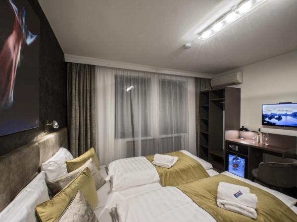 Herbstyle : photo 1 de la chambre chambre double ou lits jumeaux avec salle de bains