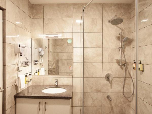 Mango Suites Viera : photo 4 de la chambre chambre double ou lits jumeaux