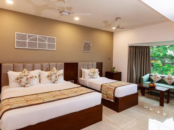Mango Suites Viera : photo 3 de la chambre grande chambre double