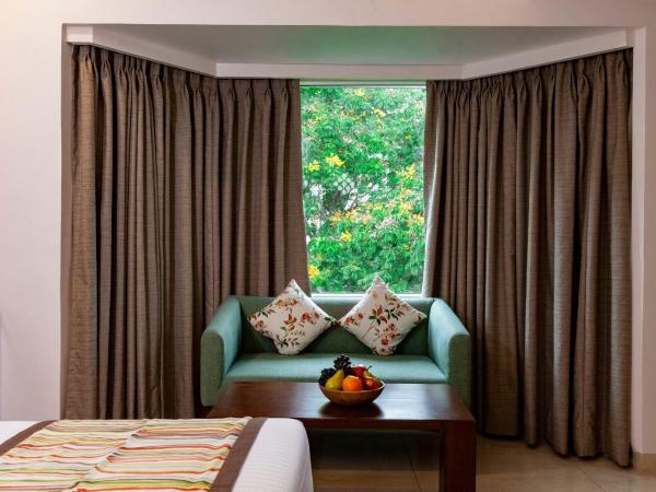 Mango Suites Viera : photo 4 de la chambre grande chambre double