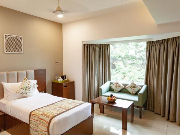 Mango Suites Viera : photo 5 de la chambre grande chambre double