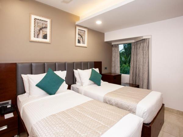 Mango Suites Viera : photo 4 de la chambre chambre deluxe double ou lits jumeaux