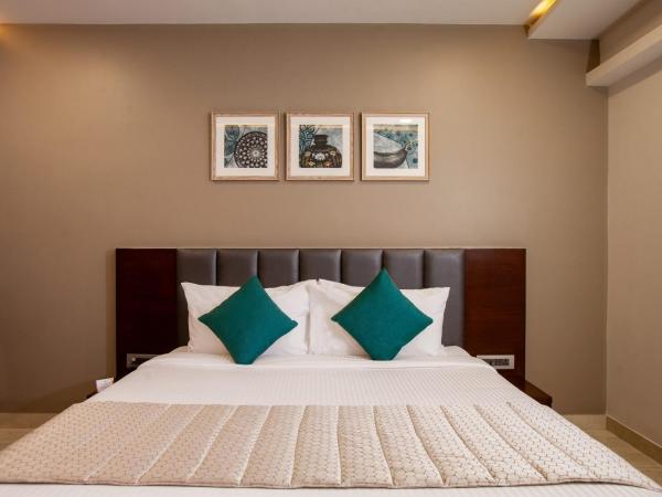 Mango Suites Viera : photo 1 de la chambre chambre double ou lits jumeaux